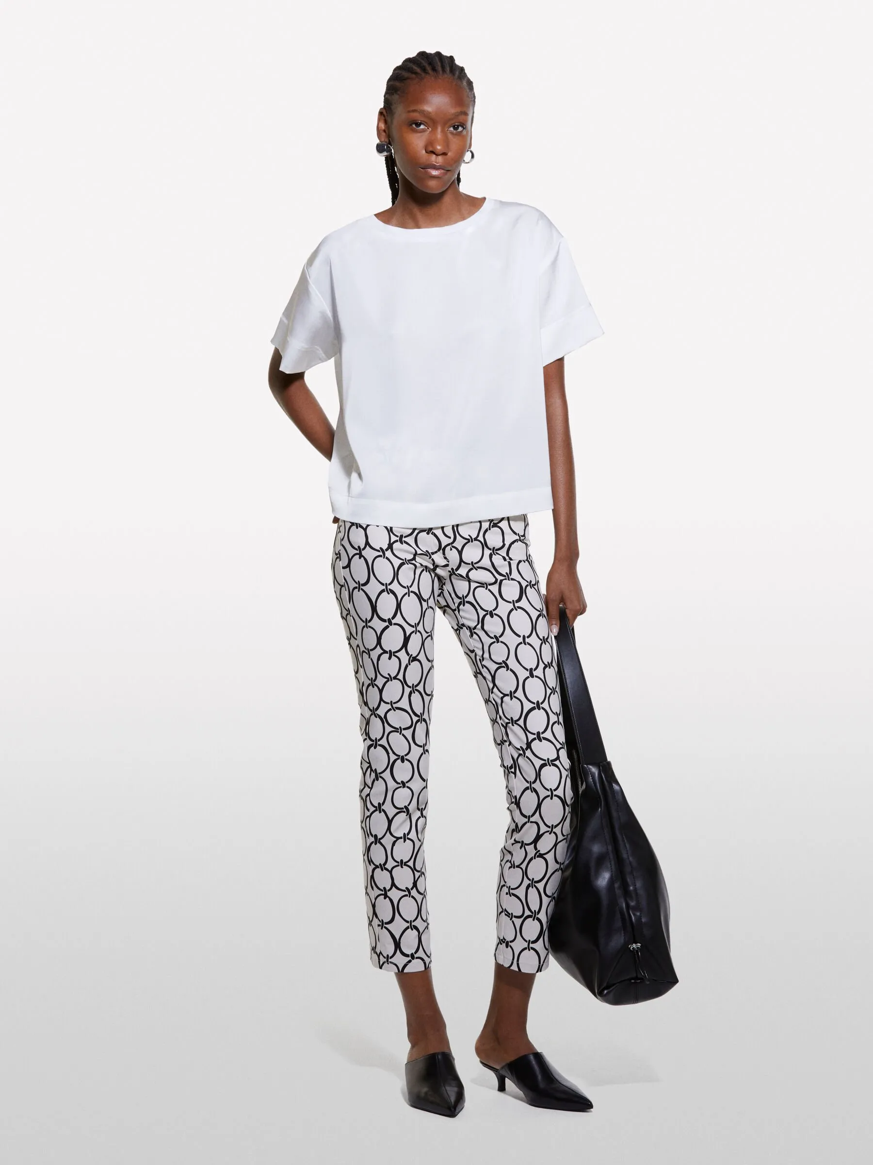 Blusa bianca a maniche corte