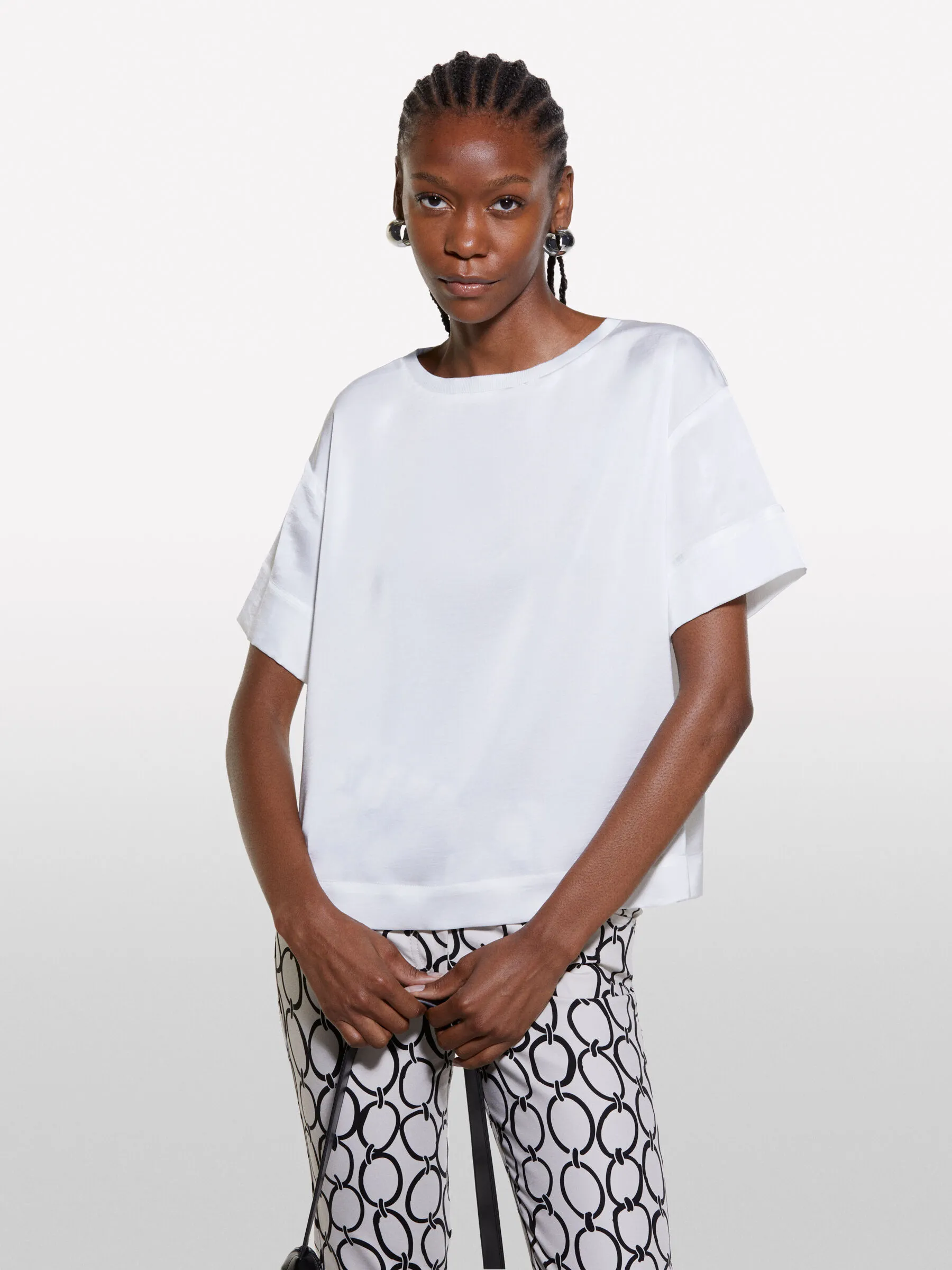 Blusa bianca a maniche corte