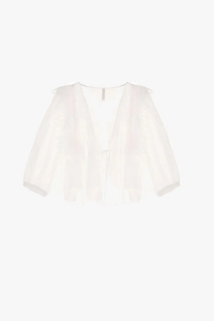 Camicia cropped con scollo a V e maniche a sbuffo