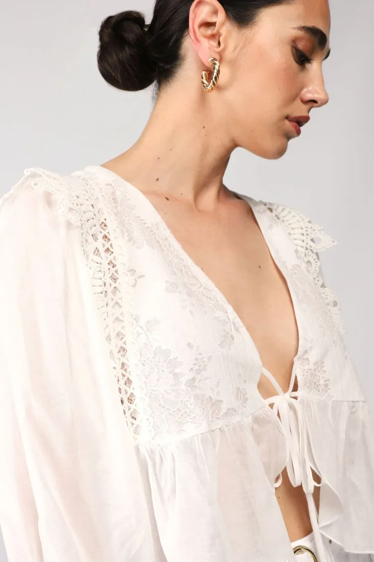 Camicia cropped con scollo a V e maniche a sbuffo