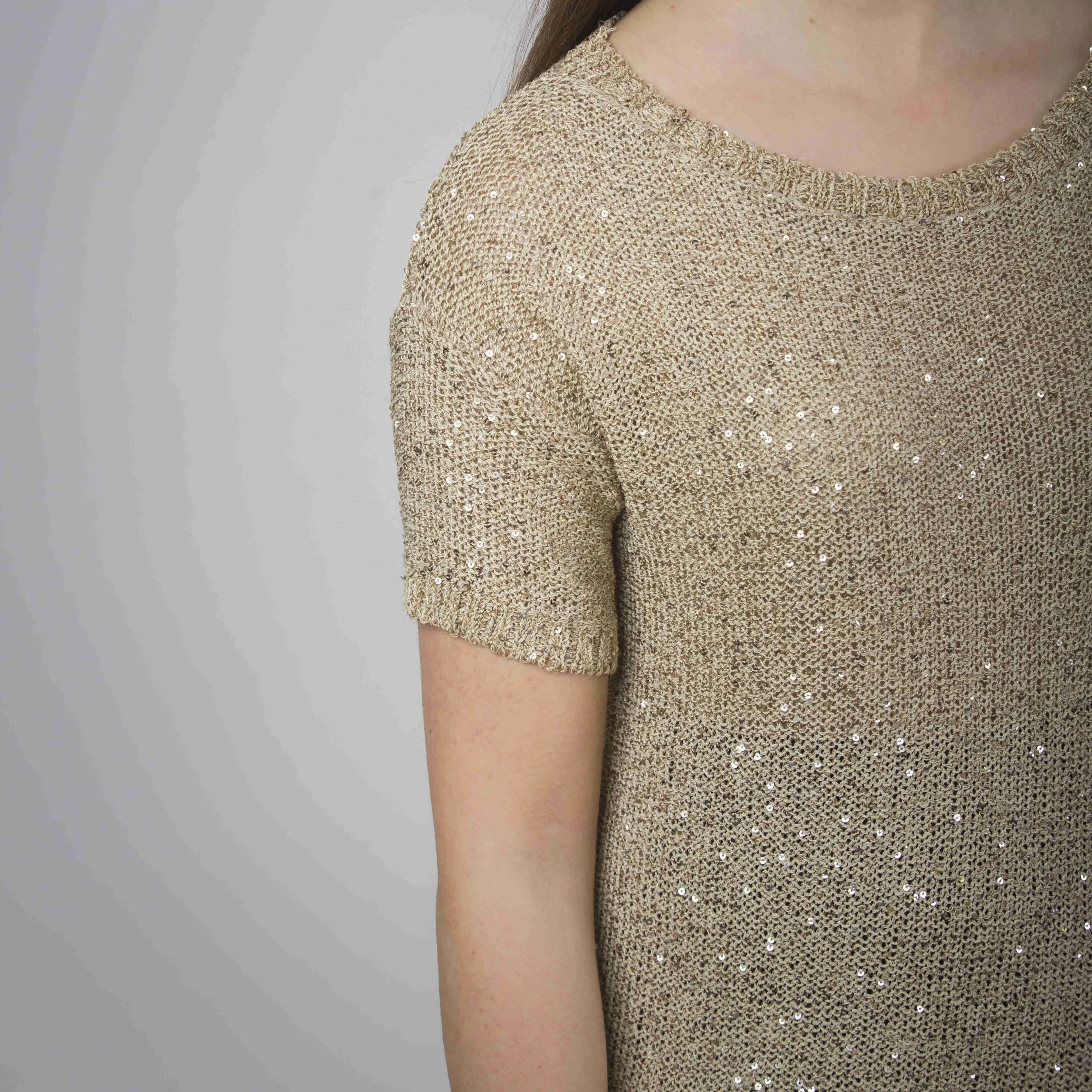 Maglia con micropaillettes a mezza manica