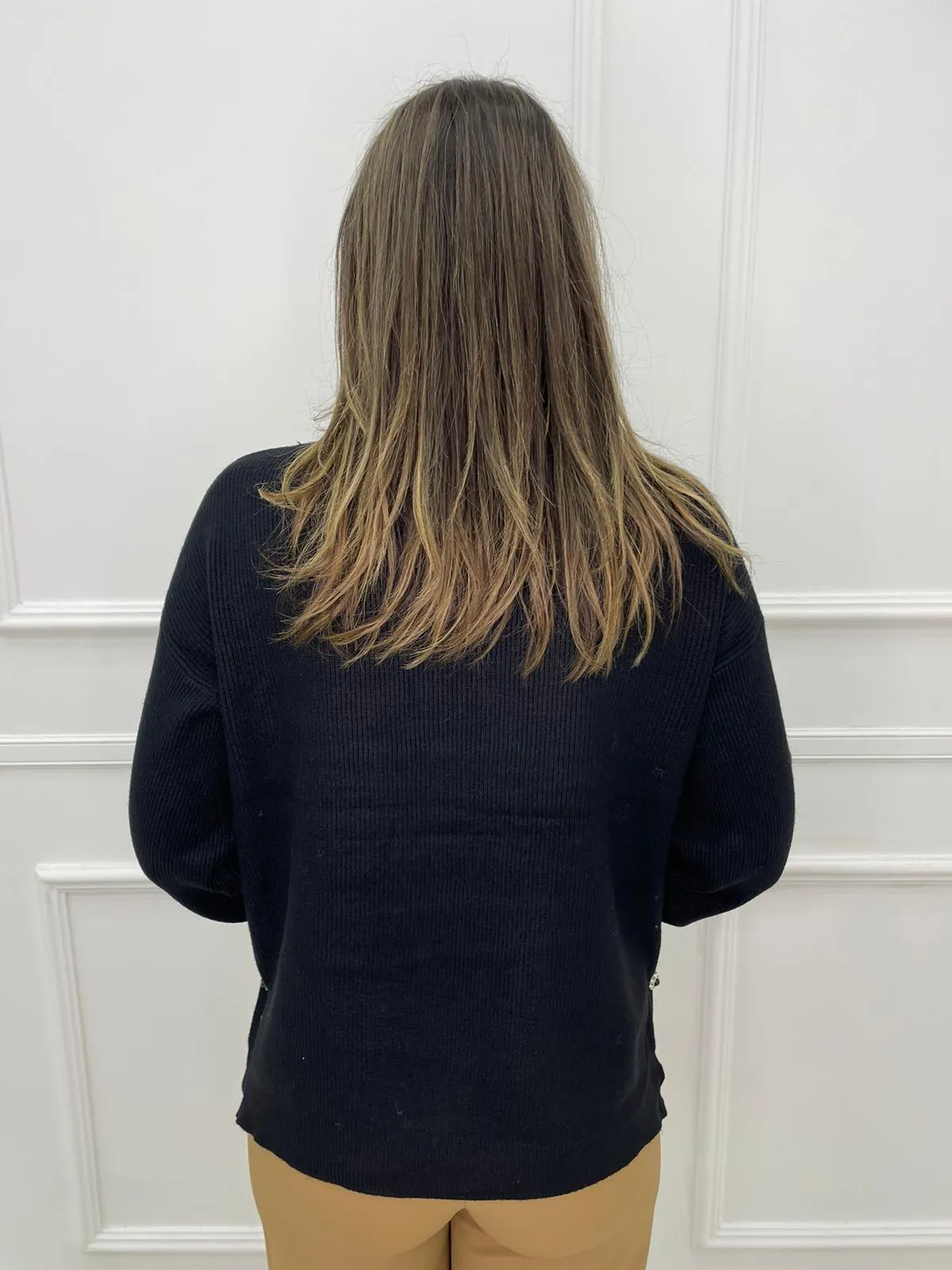 Maglione over collo alto asimmetrico sotto