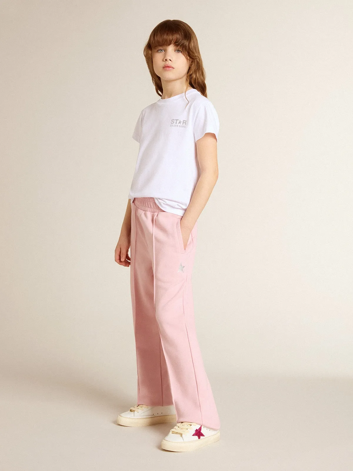 Pantalone jogging rosa con stella in glitter sul davanti