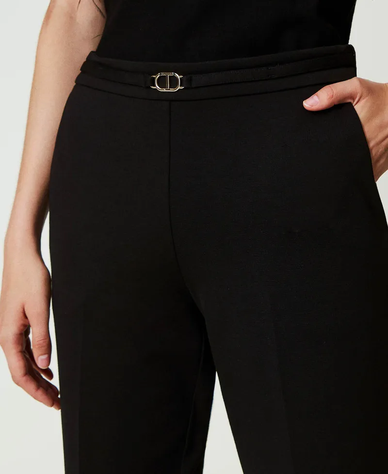 Pantaloni con cinturino Oval T e piega