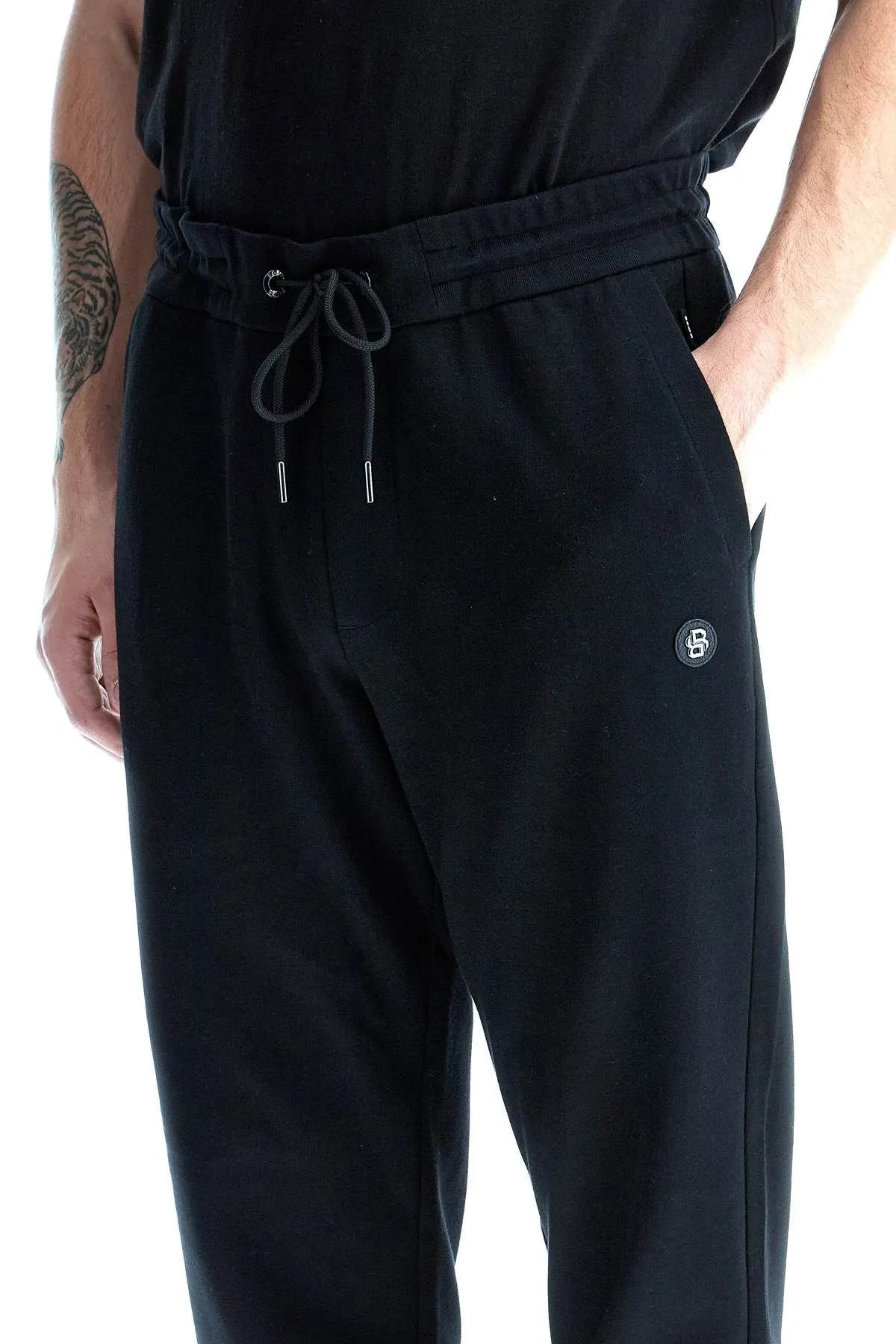 Pantaloni jogger con patch doppio monogramma