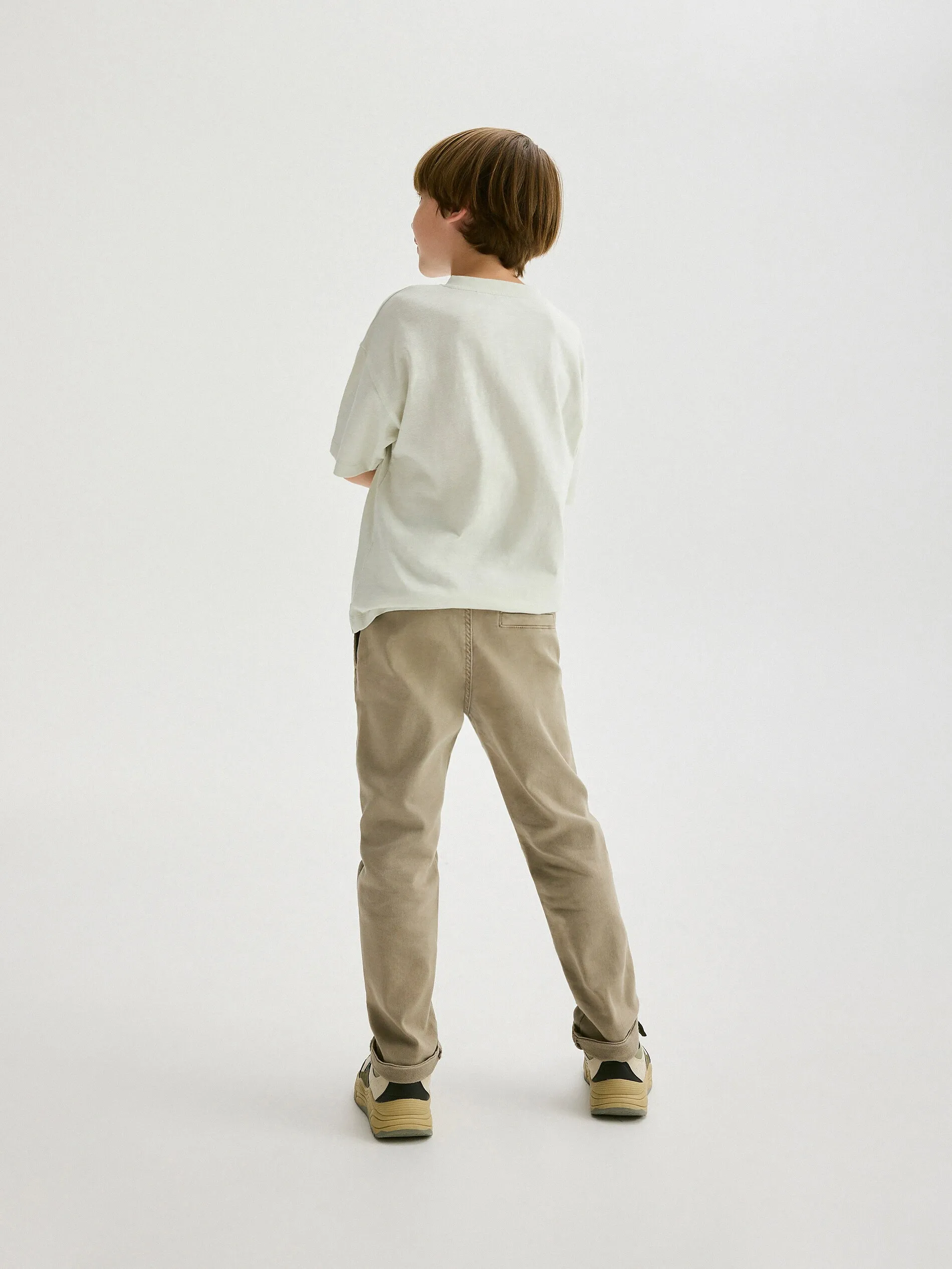 Pantaloni regular altamente elasticizzati