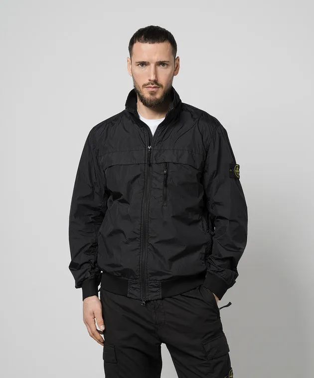 Stone Island Giacca a vento nera con patch logo removibile 801541022