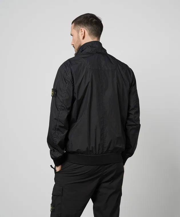 Stone Island Giacca a vento nera con patch logo removibile 801541022