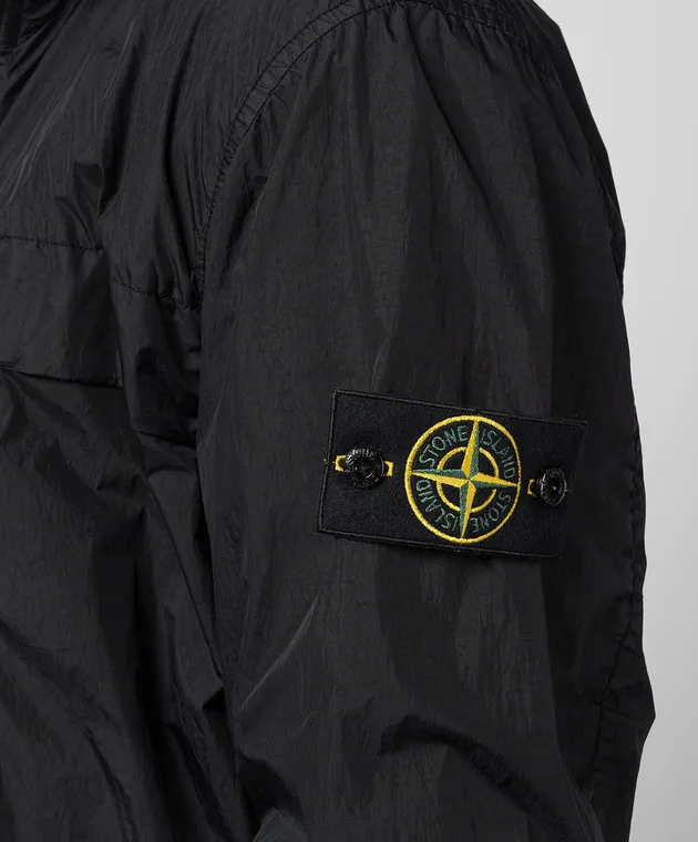 Stone Island Giacca a vento nera con patch logo removibile 801541022
